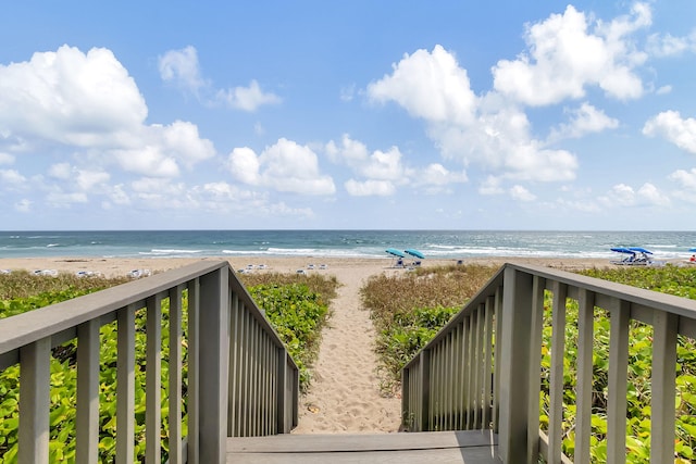 view of water feature with a beach view