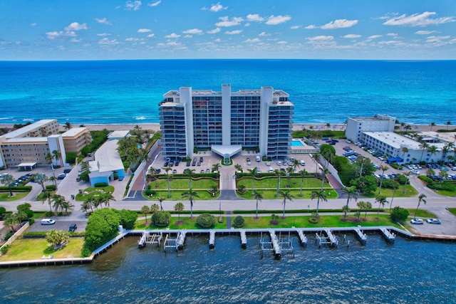 birds eye view of property with a water view