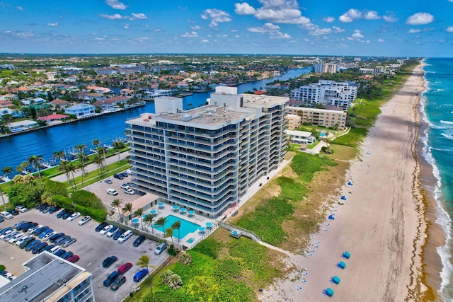 bird's eye view featuring a beach view and a water view