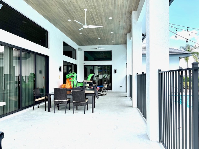 view of patio / terrace featuring ceiling fan