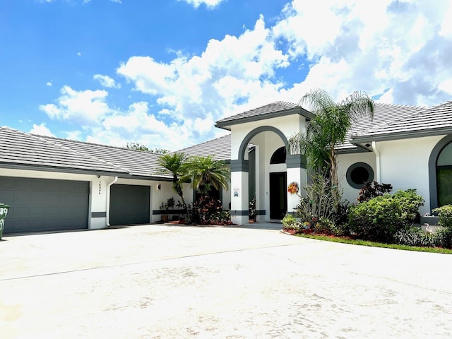 view of front of home with a garage