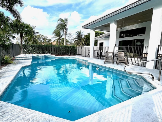 view of swimming pool featuring a patio