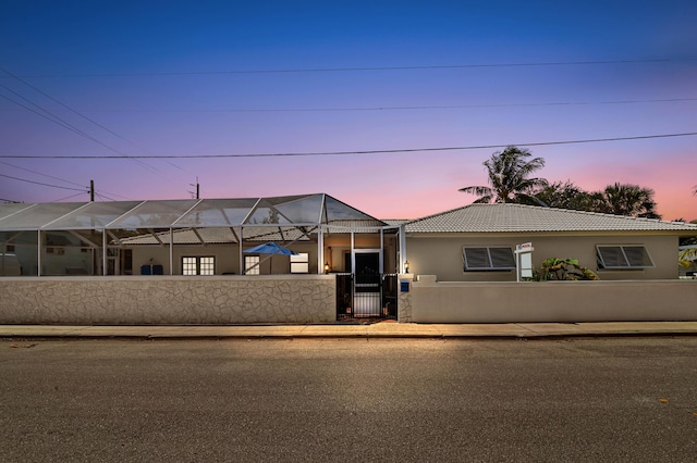 view of front of home with a lanai