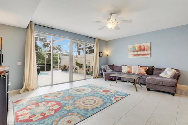 tiled living room with ceiling fan