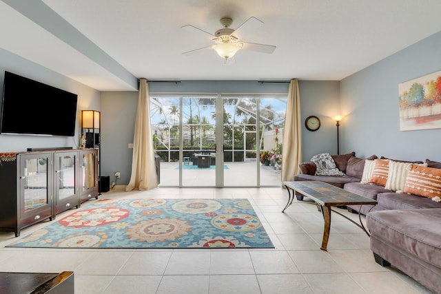 tiled living room with ceiling fan