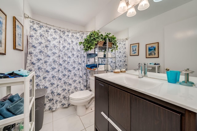 bathroom featuring toilet, a shower with curtain, vanity, and tile patterned flooring