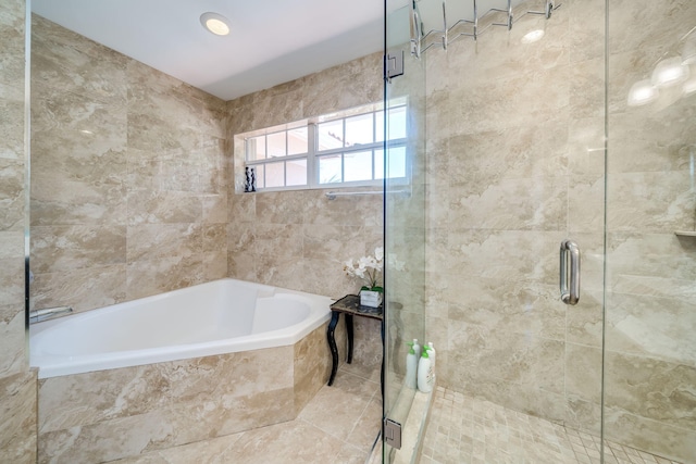 bathroom with tile patterned floors and plus walk in shower