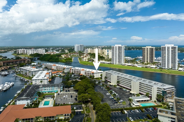 birds eye view of property featuring a water view