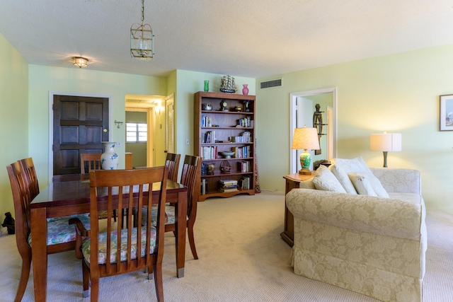 dining room with carpet flooring