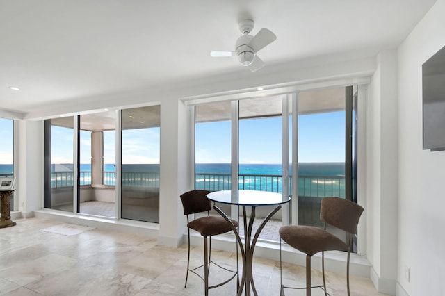 dining room with ceiling fan and plenty of natural light