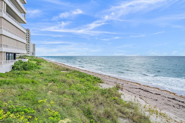 property view of water featuring a beach view