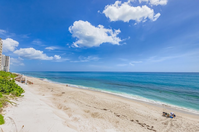 property view of water featuring a beach view