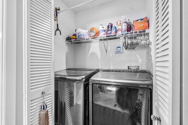 laundry room with washer and dryer