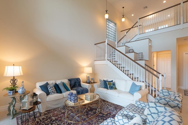 living room with a high ceiling