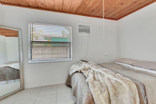 bedroom featuring a wall mounted AC, wooden ceiling, and light tile flooring