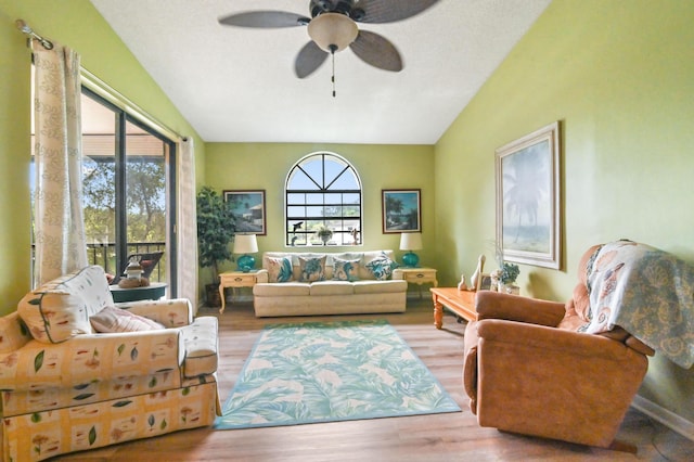 sunroom / solarium featuring ceiling fan and lofted ceiling