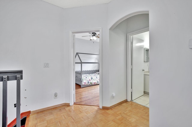 corridor with light parquet flooring