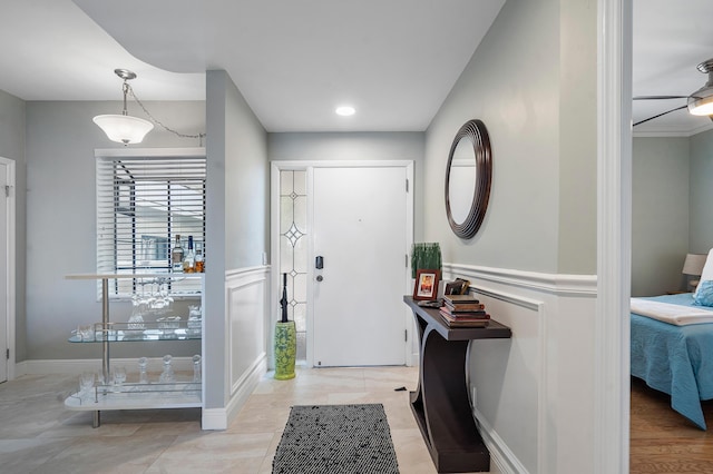 foyer entrance featuring light tile patterned flooring