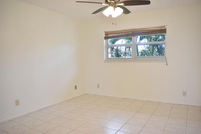 tiled empty room with ceiling fan