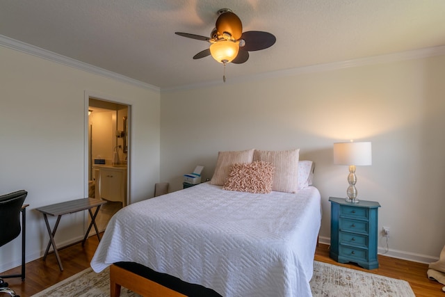 bedroom featuring connected bathroom, ceiling fan, hardwood / wood-style floors, and crown molding