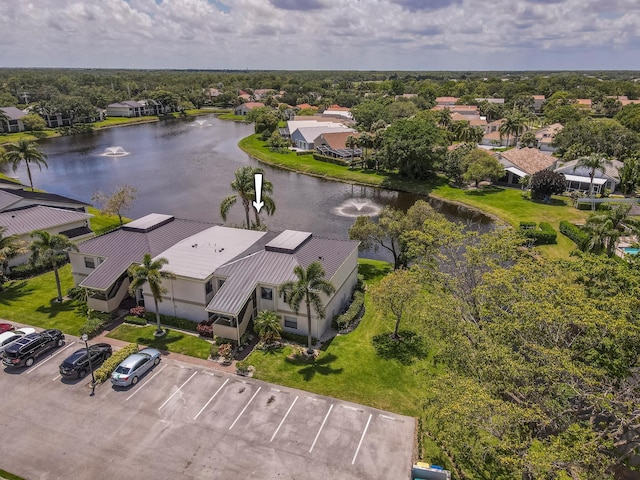 bird's eye view with a water view