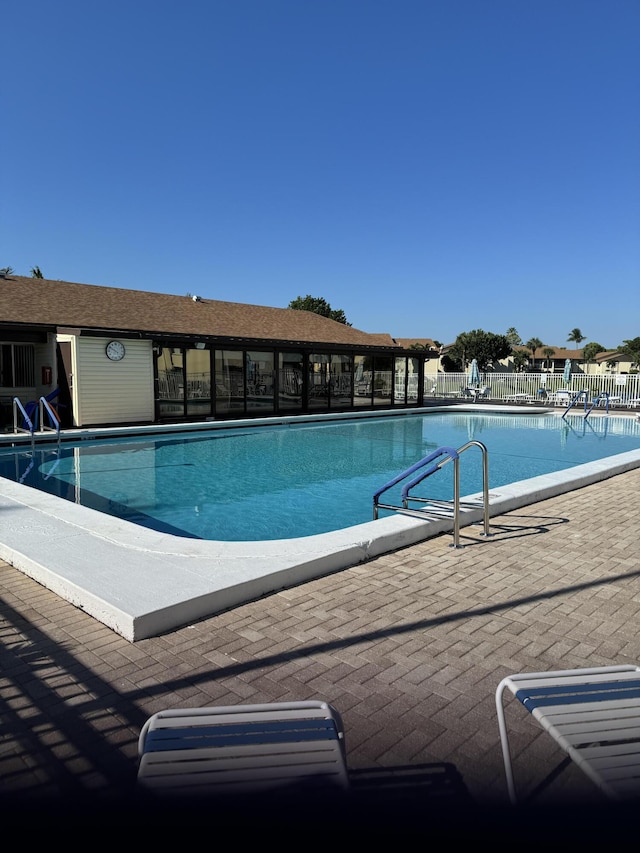3560 Pine Tree Ct Unit A-2, Greenacres, FL 33463 - pool featuring fence and a patio