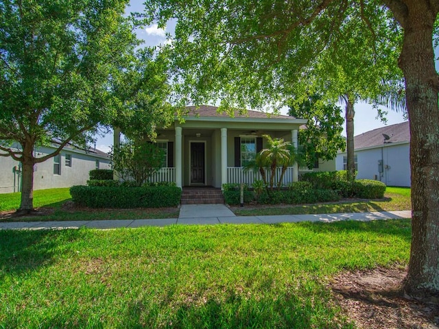 view of front of house featuring a front lawn and a porch