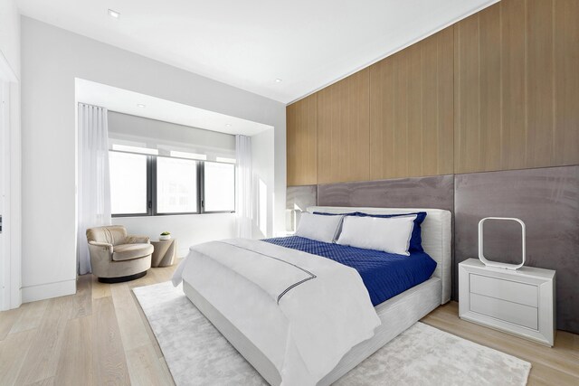 bedroom featuring light hardwood / wood-style floors