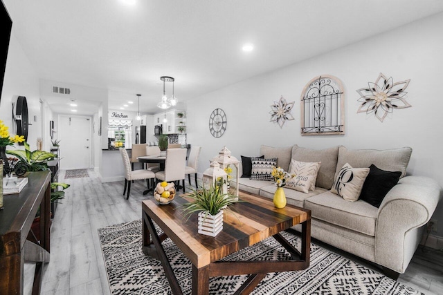 living room with hardwood / wood-style flooring