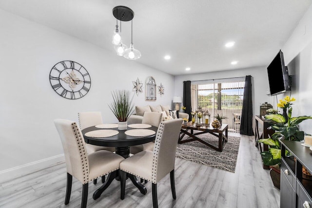 dining room featuring light hardwood / wood-style floors