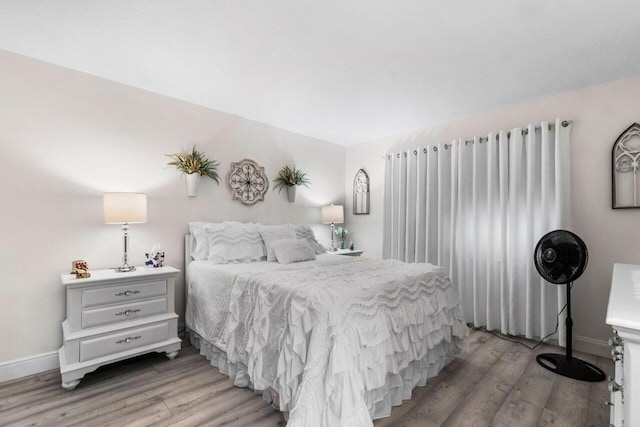 bedroom featuring hardwood / wood-style floors