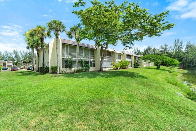 exterior space featuring a lawn