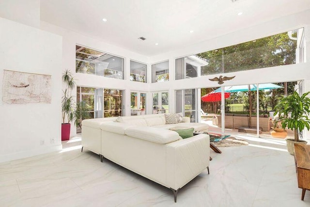 sunroom featuring plenty of natural light