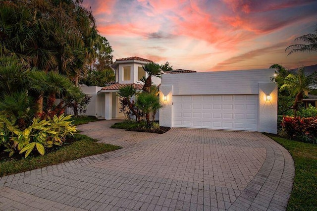 view of front of property featuring a garage