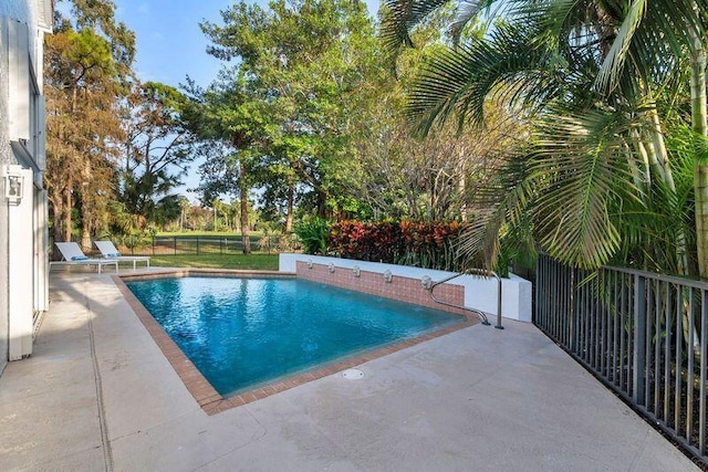 view of pool featuring a patio