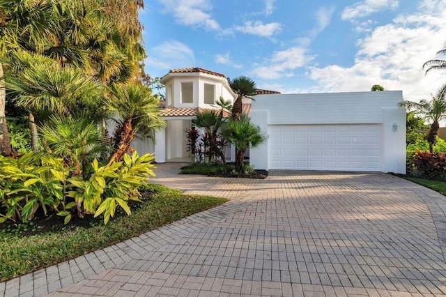 view of front of property featuring a garage