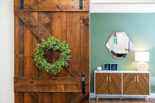 interior details featuring dark hardwood / wood-style floors