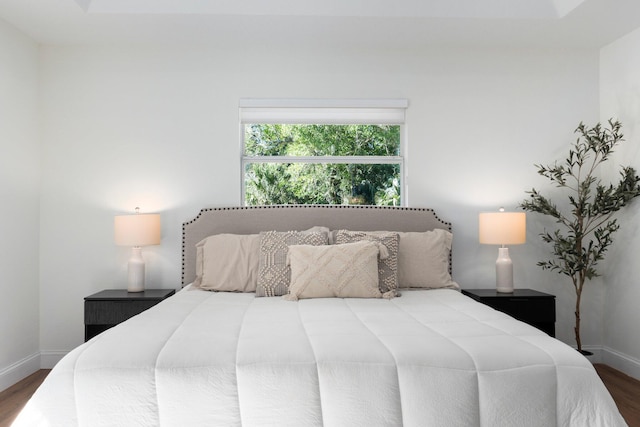 bedroom featuring wood-type flooring