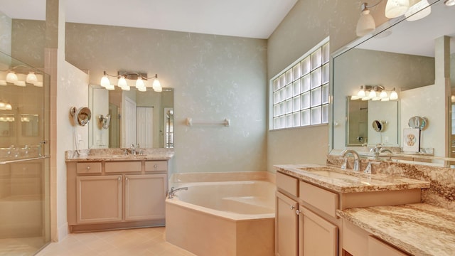 bathroom with separate shower and tub, dual sinks, tile floors, and large vanity