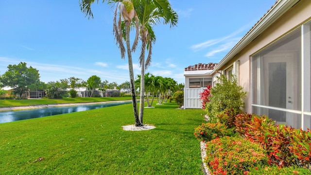 view of yard with a water view