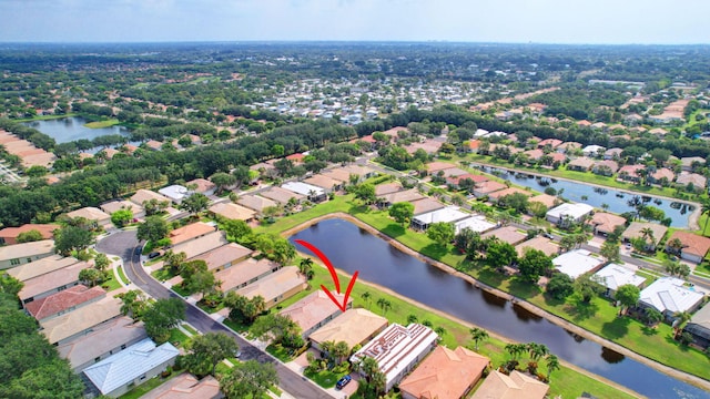 bird's eye view with a water view