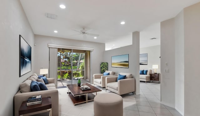 living room featuring ceiling fan and light tile floors