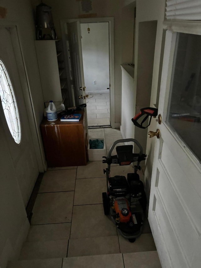 interior space with light tile patterned floors