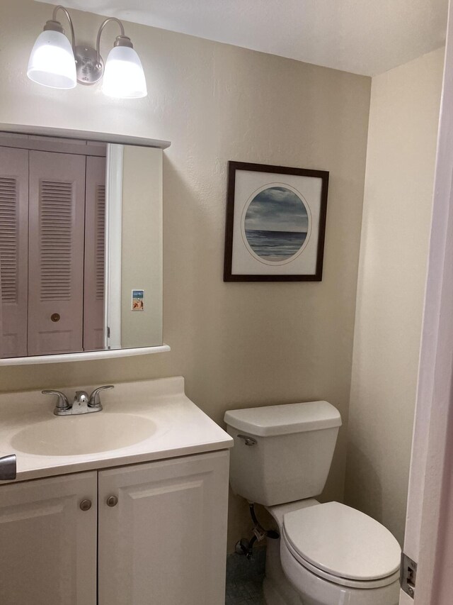 226 Camden J, West Palm Beach, FL 33417 - bathroom featuring toilet and vanity