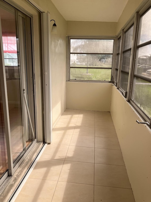 226 Camden J, West Palm Beach, FL 33417 - unfurnished sunroom featuring plenty of natural light