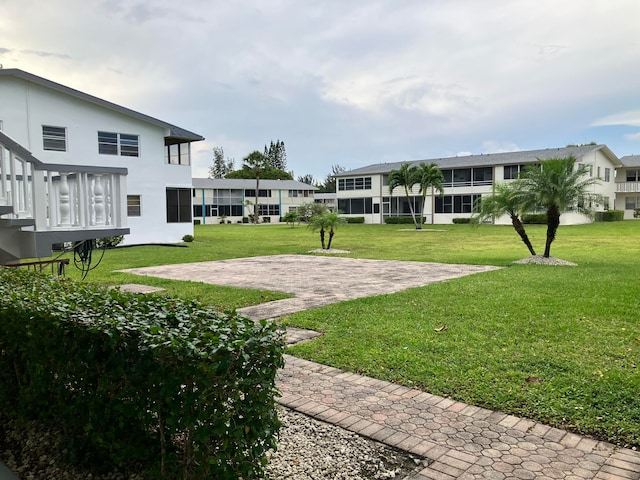 surrounding community featuring a lawn