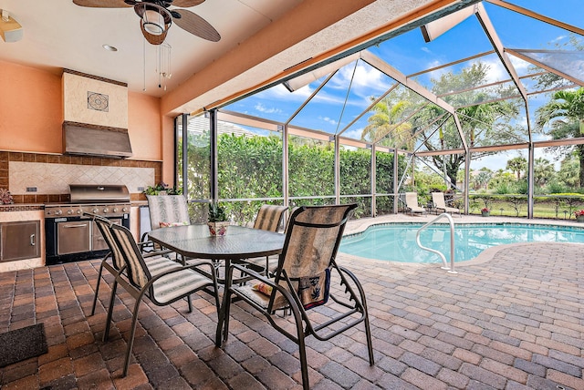 view of swimming pool with a patio, a lanai, area for grilling, and ceiling fan