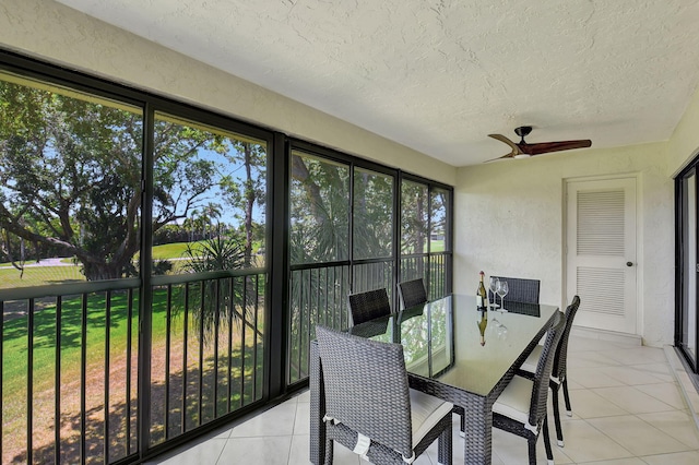 sunroom / solarium with ceiling fan