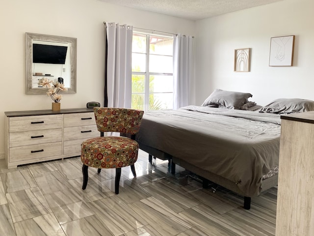 bedroom with a textured ceiling