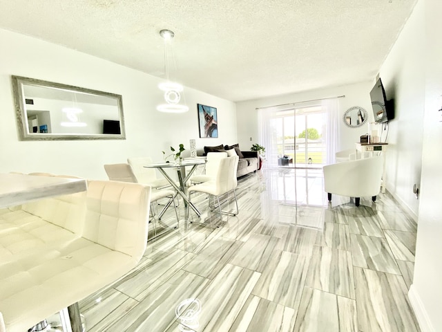 living room with a textured ceiling